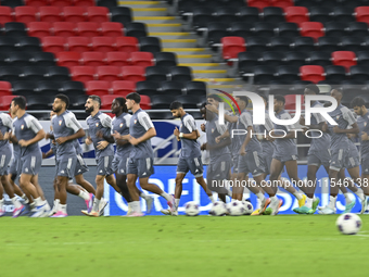 Players of the United Arab Emirates National team train at Ahmad Bin Ali Stadium in Al Rayyan, Qatar, on September 4, 2024, on the eve of th...