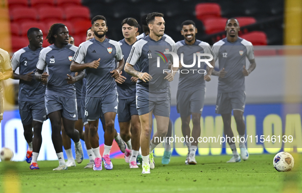 Players of the United Arab Emirates National team train at Ahmad Bin Ali Stadium in Al Rayyan, Qatar, on September 4, 2024, on the eve of th...