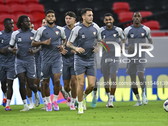 Players of the United Arab Emirates National team train at Ahmad Bin Ali Stadium in Al Rayyan, Qatar, on September 4, 2024, on the eve of th...