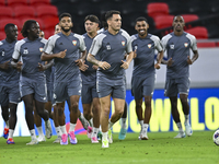 Players of the United Arab Emirates National team train at Ahmad Bin Ali Stadium in Al Rayyan, Qatar, on September 4, 2024, on the eve of th...