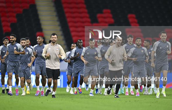 Players of the United Arab Emirates National team train at Ahmad Bin Ali Stadium in Al Rayyan, Qatar, on September 4, 2024, on the eve of th...