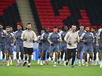 Players of the United Arab Emirates National team train at Ahmad Bin Ali Stadium in Al Rayyan, Qatar, on September 4, 2024, on the eve of th...