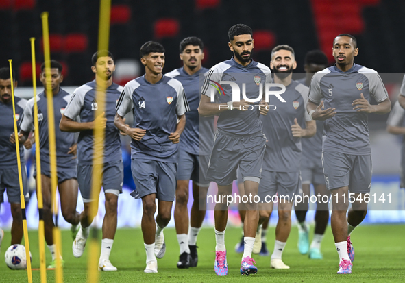 Players of the United Arab Emirates National team train at Ahmad Bin Ali Stadium in Al Rayyan, Qatar, on September 4, 2024, on the eve of th...