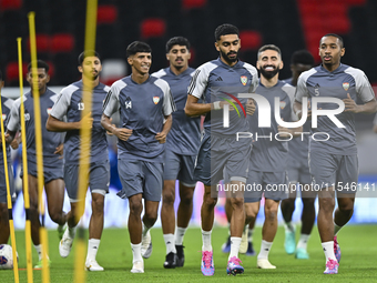 Players of the United Arab Emirates National team train at Ahmad Bin Ali Stadium in Al Rayyan, Qatar, on September 4, 2024, on the eve of th...