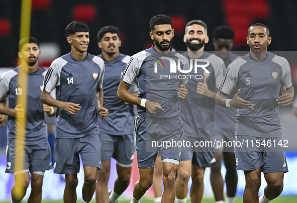 Players of the United Arab Emirates National team train at Ahmad Bin Ali Stadium in Al Rayyan, Qatar, on September 4, 2024, on the eve of th...