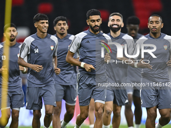 Players of the United Arab Emirates National team train at Ahmad Bin Ali Stadium in Al Rayyan, Qatar, on September 4, 2024, on the eve of th...