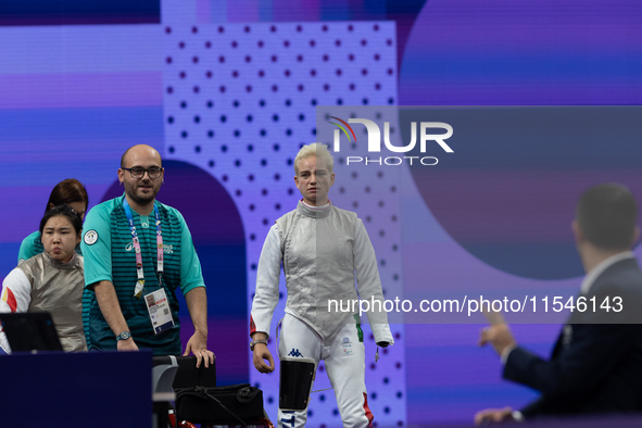 Beatrice Maria ''Bebe'' Vio Grandis of Italy waits to enter the field of play for the match against Rong Xiao of China during the Women's Fo...