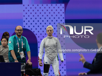 Beatrice Maria ''Bebe'' Vio Grandis of Italy waits to enter the field of play for the match against Rong Xiao of China during the Women's Fo...