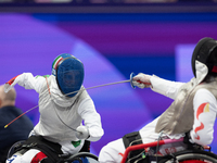 Beatrice Maria ''Bebe'' Vio Grandis of Italy competes against Rong Xiao of China during the Women's Foil Category B Semifinal at Gran Palais...