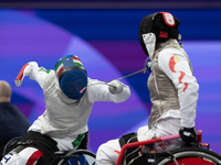 Beatrice Maria ''Bebe'' Vio Grandis of Italy competes against Rong Xiao of China during the Women's Foil Category B Semifinal at Gran Palais...