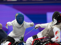 Beatrice Maria ''Bebe'' Vio Grandis of Italy competes against Rong Xiao of China during the Women's Foil Category B Semifinal at Gran Palais...