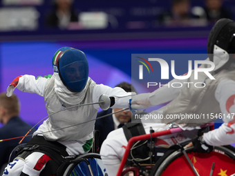 Beatrice Maria ''Bebe'' Vio Grandis of Italy competes against Rong Xiao of China during the Women's Foil Category B Semifinal at Gran Palais...