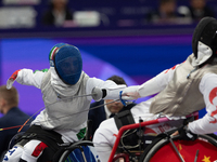 Beatrice Maria ''Bebe'' Vio Grandis of Italy competes against Rong Xiao of China during the Women's Foil Category B Semifinal at Gran Palais...