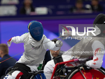 Beatrice Maria ''Bebe'' Vio Grandis of Italy competes against Rong Xiao of China during the Women's Foil Category B Semifinal at Gran Palais...