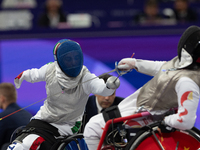 Beatrice Maria ''Bebe'' Vio Grandis of Italy competes against Rong Xiao of China during the Women's Foil Category B Semifinal at Gran Palais...