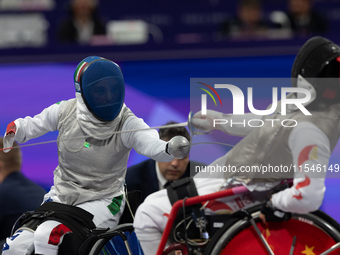 Beatrice Maria ''Bebe'' Vio Grandis of Italy competes against Rong Xiao of China during the Women's Foil Category B Semifinal at Gran Palais...