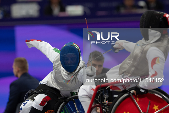 Beatrice Maria ''Bebe'' Vio Grandis of Italy competes against Rong Xiao of China during the Women's Foil Category B Semifinal at Gran Palais...