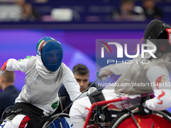 Beatrice Maria ''Bebe'' Vio Grandis of Italy competes against Rong Xiao of China during the Women's Foil Category B Semifinal at Gran Palais...