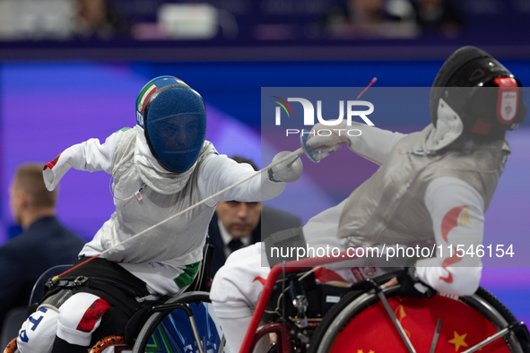 Beatrice Maria ''Bebe'' Vio Grandis of Italy competes against Rong Xiao of China during the Women's Foil Category B Semifinal at Gran Palais...