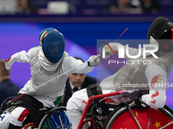 Beatrice Maria ''Bebe'' Vio Grandis of Italy competes against Rong Xiao of China during the Women's Foil Category B Semifinal at Gran Palais...