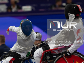 Beatrice Maria ''Bebe'' Vio Grandis of Italy competes against Rong Xiao of China during the Women's Foil Category B Semifinal at Gran Palais...