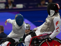 Beatrice Maria ''Bebe'' Vio Grandis of Italy competes against Rong Xiao of China during the Women's Foil Category B Semifinal at Gran Palais...