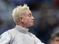 Beatrice Maria ''Bebe'' Vio Grandis of Italy reacts after she loses against Rong Xiao of China during the Women's Foil Category B Semifinal...