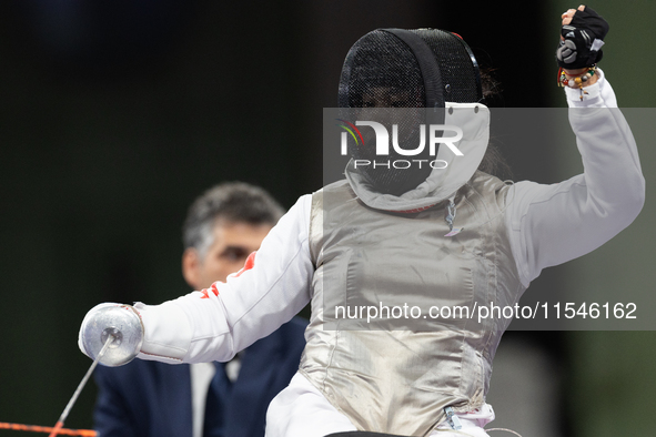 Rong Xiao of China reacts after she wins against Beatrice Maria ''Bebe'' Vio Grandis during the Women's Foil Category B Semifinal at Gran Pa...