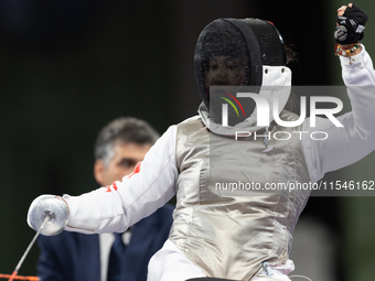 Rong Xiao of China reacts after she wins against Beatrice Maria ''Bebe'' Vio Grandis during the Women's Foil Category B Semifinal at Gran Pa...