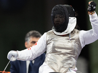 Rong Xiao of China reacts after she wins against Beatrice Maria ''Bebe'' Vio Grandis during the Women's Foil Category B Semifinal at Gran Pa...