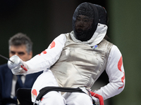 Rong Xiao of China and Beatrice Maria ''Bebe'' Vio Grandis of Italy compete during the Women's Foil Category B Semifinal at Gran Palais duri...