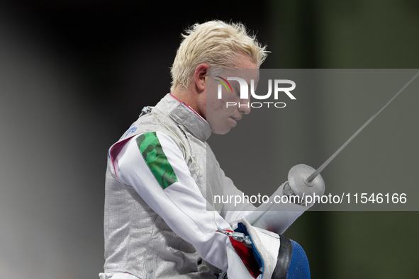 Beatrice Maria ''Bebe'' Vio Grandis of Italy reacts after she loses against Rong Xiao of China during the Women's Foil Category B Semifinal...