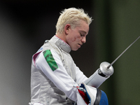 Beatrice Maria ''Bebe'' Vio Grandis of Italy reacts after she loses against Rong Xiao of China during the Women's Foil Category B Semifinal...