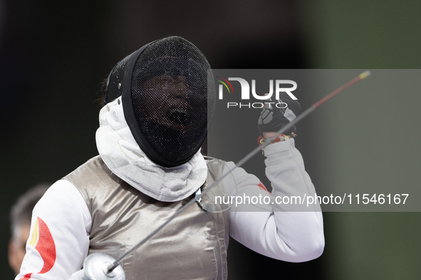 Rong Xiao of China reacts after she wins against Beatrice Maria ''Bebe'' Vio Grandis during the Women's Foil Category B Semifinal at Gran Pa...