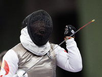 Rong Xiao of China reacts after she wins against Beatrice Maria ''Bebe'' Vio Grandis during the Women's Foil Category B Semifinal at Gran Pa...