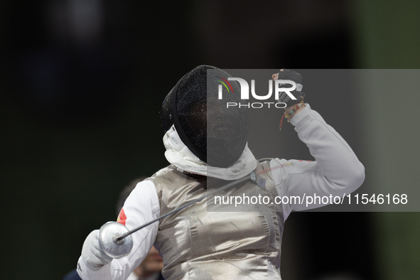 Rong Xiao of China reacts after she wins against Beatrice Maria ''Bebe'' Vio Grandis during the Women's Foil Category B Semifinal at Gran Pa...