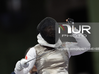 Rong Xiao of China reacts after she wins against Beatrice Maria ''Bebe'' Vio Grandis during the Women's Foil Category B Semifinal at Gran Pa...