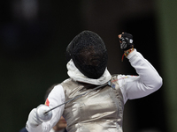 Rong Xiao of China reacts after she wins against Beatrice Maria ''Bebe'' Vio Grandis during the Women's Foil Category B Semifinal at Gran Pa...