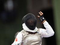 Rong Xiao of China reacts after she wins against Beatrice Maria ''Bebe'' Vio Grandis during the Women's Foil Category B Semifinal at Gran Pa...