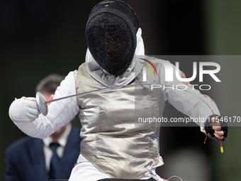 Rong Xiao of China and Beatrice Maria ''Bebe'' Vio Grandis of Italy compete during the Women's Foil Category B Semifinal at Gran Palais duri...