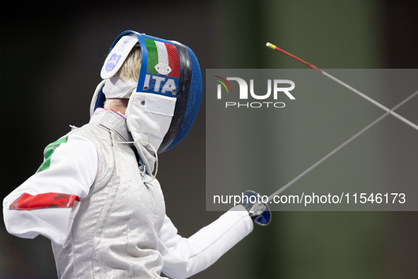 Beatrice Maria ''Bebe'' Vio Grandis of Italy competes against Rong Xiao of China during the Women's Foil Category B Semifinal at Gran Palais...