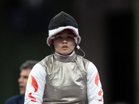 Rong Xiao of China and Beatrice Maria ''Bebe'' Vio Grandis of Italy compete during the Women's Foil Category B Semifinal at Gran Palais duri...