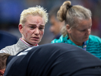 Beatrice Maria ''Bebe'' Vio Grandis of Italy reacts after she loses against Rong Xiao of China during the Women's Foil Category B Semifinal...