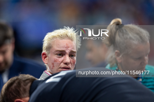 Beatrice Maria ''Bebe'' Vio Grandis of Italy reacts after she loses against Rong Xiao of China during the Women's Foil Category B Semifinal...