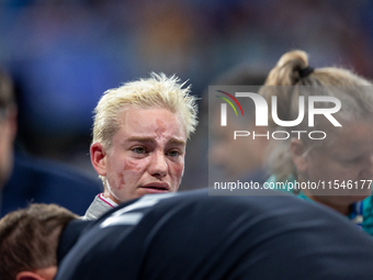 Beatrice Maria ''Bebe'' Vio Grandis of Italy reacts after she loses against Rong Xiao of China during the Women's Foil Category B Semifinal...