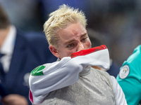 Beatrice Maria ''Bebe'' Vio Grandis of Italy reacts after she loses against Rong Xiao of China during the Women's Foil Category B Semifinal...