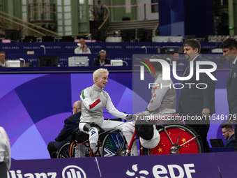 Beatrice Maria ''Bebe'' Vio Grandis of Italy competes against Rong Xiao of China during the Women's Foil Category B Semifinal at Gran Palais...