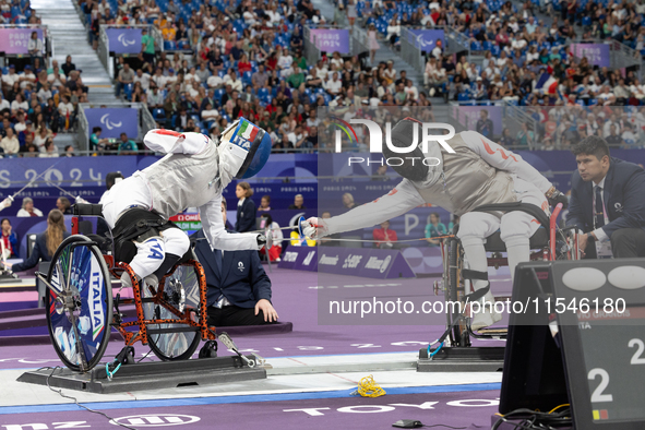 Beatrice Maria ''Bebe'' Vio Grandis of Italy competes against Rong Xiao of China during the Women's Foil Category B Semifinal at Gran Palais...