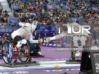 Beatrice Maria ''Bebe'' Vio Grandis of Italy competes against Rong Xiao of China during the Women's Foil Category B Semifinal at Gran Palais...