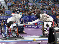 Beatrice Maria ''Bebe'' Vio Grandis of Italy competes against Rong Xiao of China during the Women's Foil Category B Semifinal at Gran Palais...